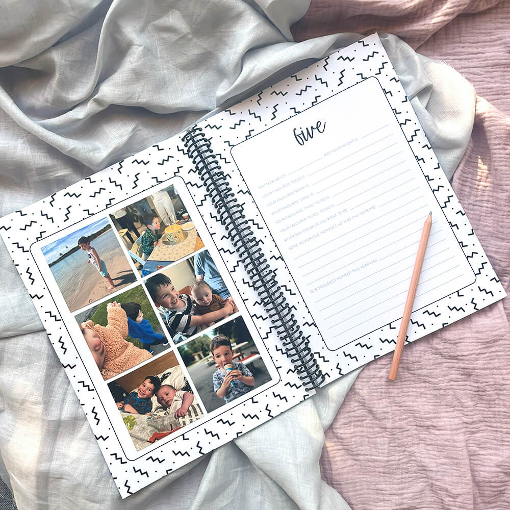 21 Years Keepsake Book open to five years old pages with photos, pencil, birthday letter keepsake by Paper Heart Design