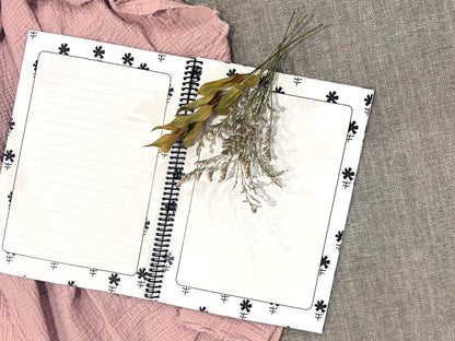 Letters to Mum keepsake book open to internal pages showing lined and blank space for letters and photos, flat lay on grey surface with pink fabric and dried flowers, by Paper Heart Design NZ