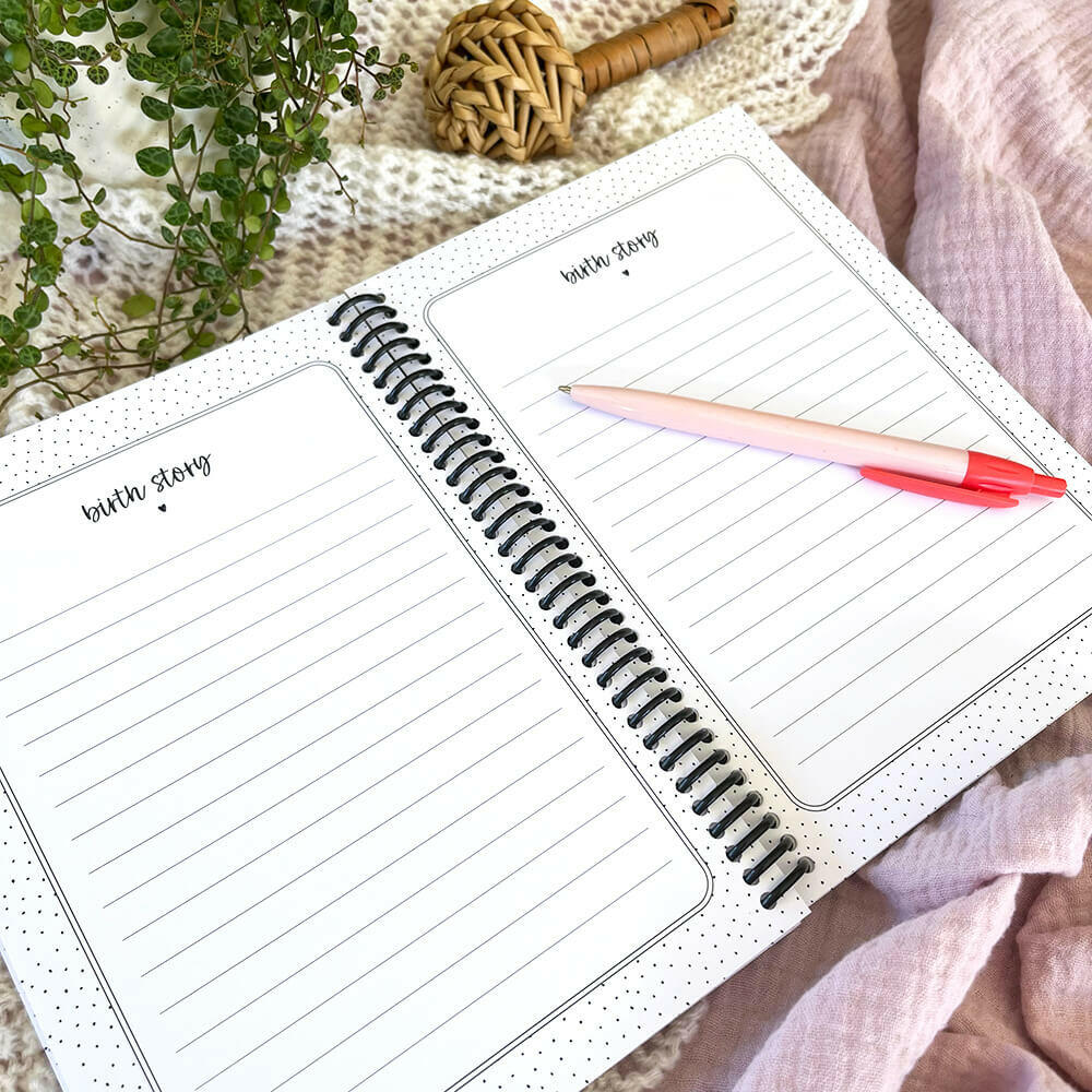 Bump to Bubba pregnancy journal open to birth story pages flat lay with pen and plant, by Paper Heart Design