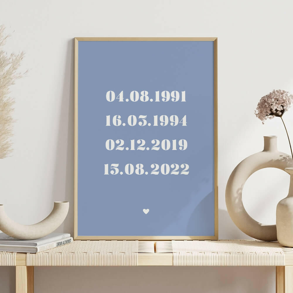 Family Dates personalised print framed in cornflower with white bold serif font on shelf with white vases, family wall art by Paper Heart Design