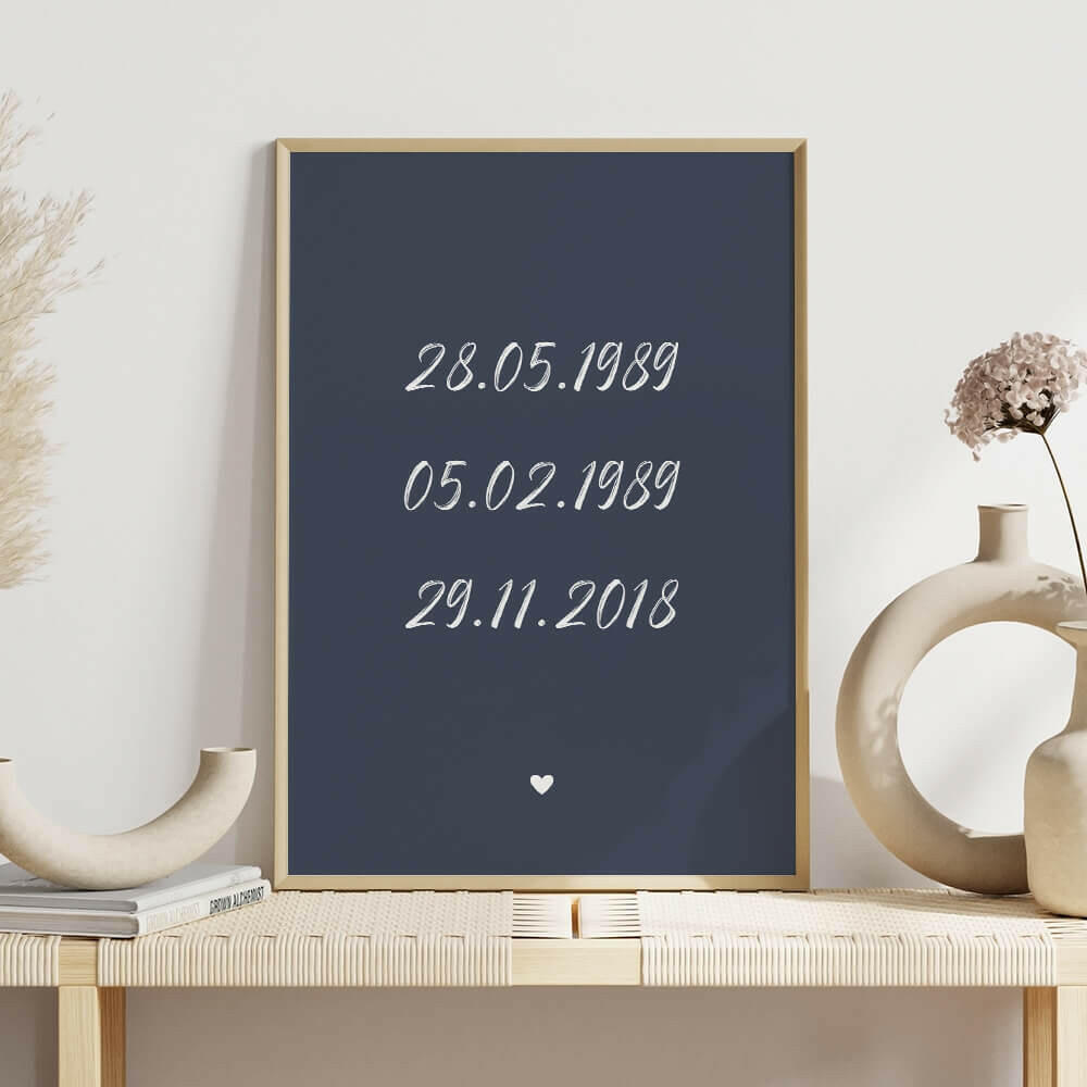 Family Dates personalised print framed in dusk with white brush script font on shelf with white vases, family wall art by Paper Heart Design