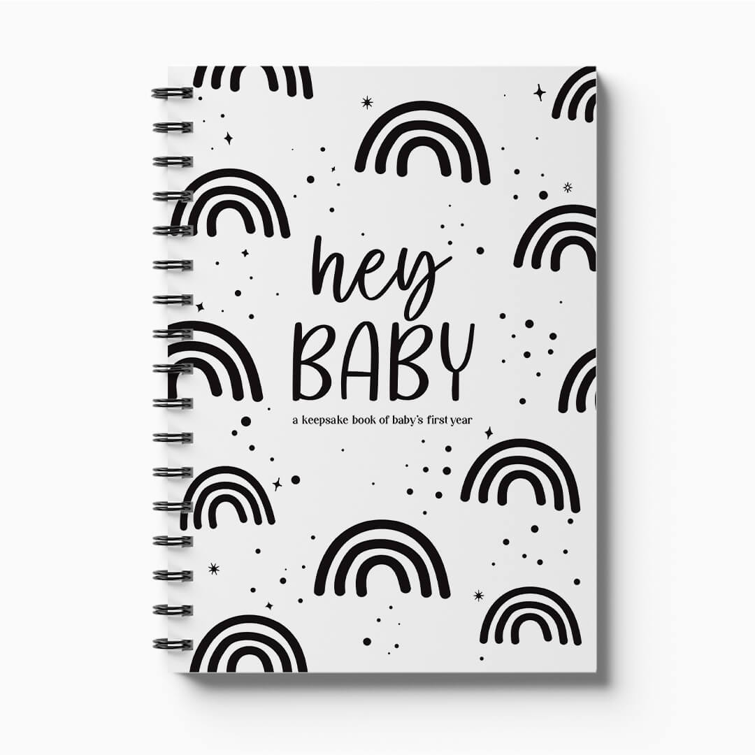 Hey Baby first year baby milestone book - front cover, designed and printed in New Zealand by Paper Heart Design