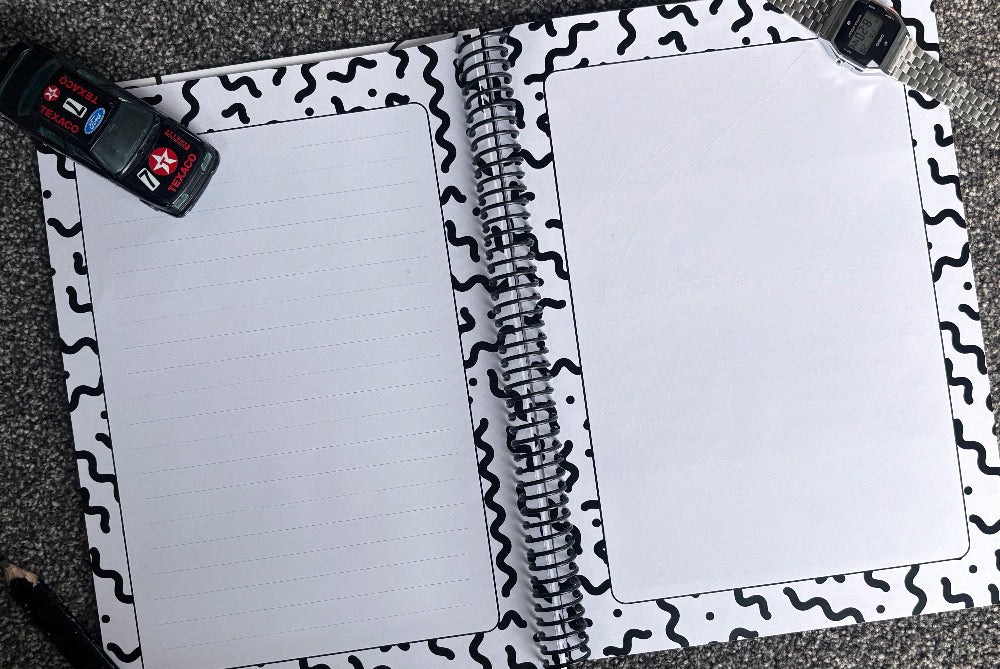  Letters to Dad keepsake book open to internal pages showing lined and blank space for letters and photos, flat lay on grey carpet with Texaco car, watch and carpenters pencil, by Paper Heart Design NZ