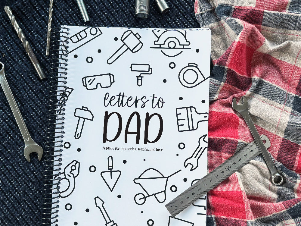 Letters to Dad keepsake book with tools cover on navy knit and red plaid background with ruler, spanner, sockets and drill bits, gift for Dad by Paper Heart Design NZ