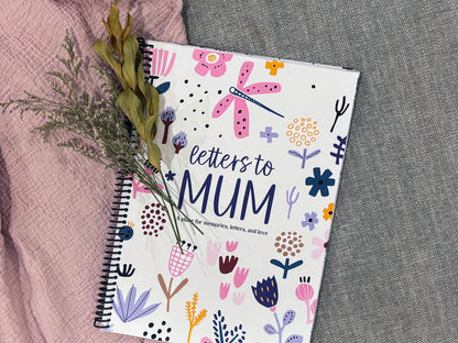 Letters to Mum keepsake book full colour cover flat lay on grey carpet with pink fabric and dried flowers, by Paper Heart Design NZ