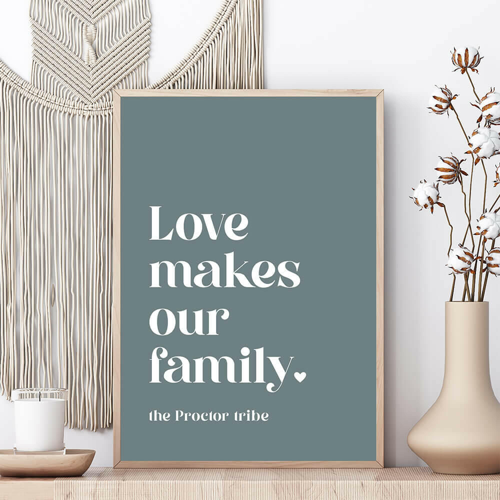 Love Makes Our Family personalised family print in willow framed on shelf with vase and candle beside and macrame wall hanging behind, by Paper Heart Design NZ