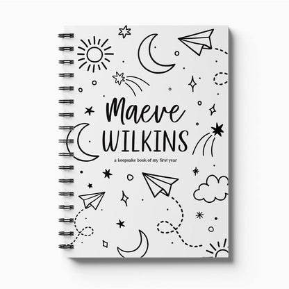Personalised Hey Baby first year milestone book with stars and moons monochrome cover on white background, custom baby keepsake by Paper Heart Design NZ