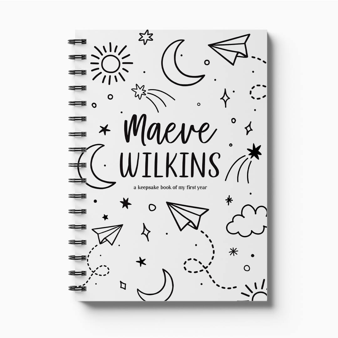 Personalised Hey Baby first year milestone book with stars and moons monochrome cover on white background, custom baby keepsake by Paper Heart Design NZ