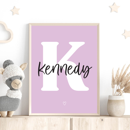 Script Initial Name Print with petal background and white K initial in wooden frame on shelf with stuffed llama and stars, nursery wall art by Paper Heart Design NZ