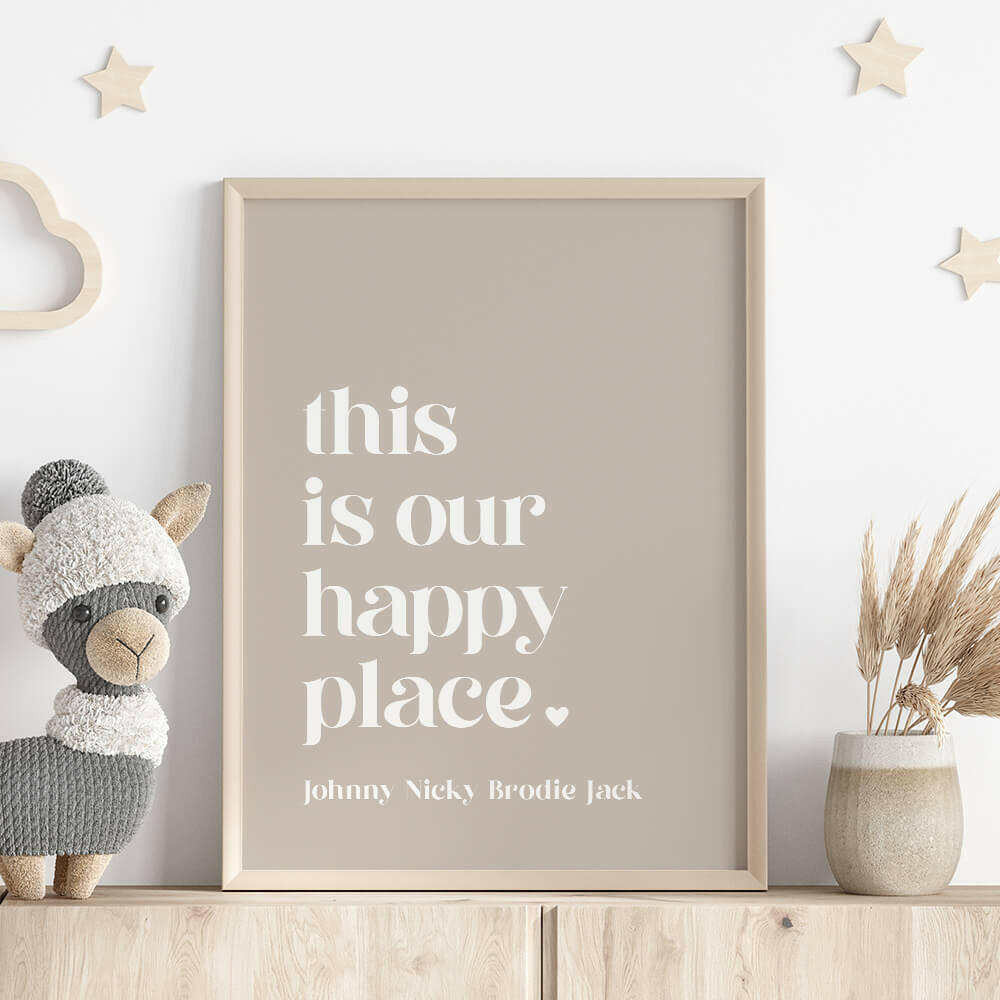 This Is Our Happy Place personalised family print in pebble framed on shelf with llama stuffed toy, wooden stars on wall and vase with dried plant, by Paper Heart Design NZ