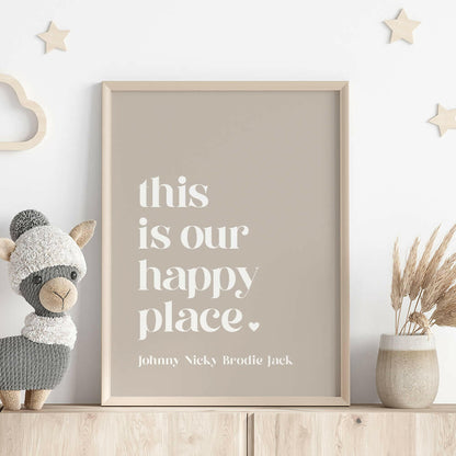 This Is Our Happy Place personalised family print in pebble framed on shelf with llama stuffed toy, wooden stars on wall and vase with dried plant, by Paper Heart Design NZ