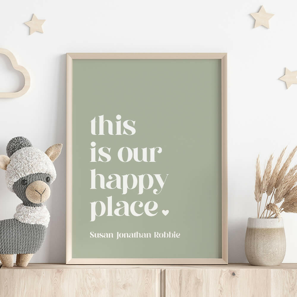 This Is Our Happy Place personalised family print in sage framed on shelf with llama stuffed toy, wooden stars on wall and vase with dried plant, by Paper Heart Design NZ