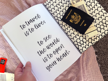Travel Adventures keepsake journal held open to back page showing travel themed quote on pink and grey background with passport and tickets, by Paper Heart Design NZ