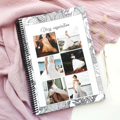 You and Me wedding planner open to dress inspiration page with sample dress photos on pink textured background with dried bunny tails, by Paper Heart Design NZ